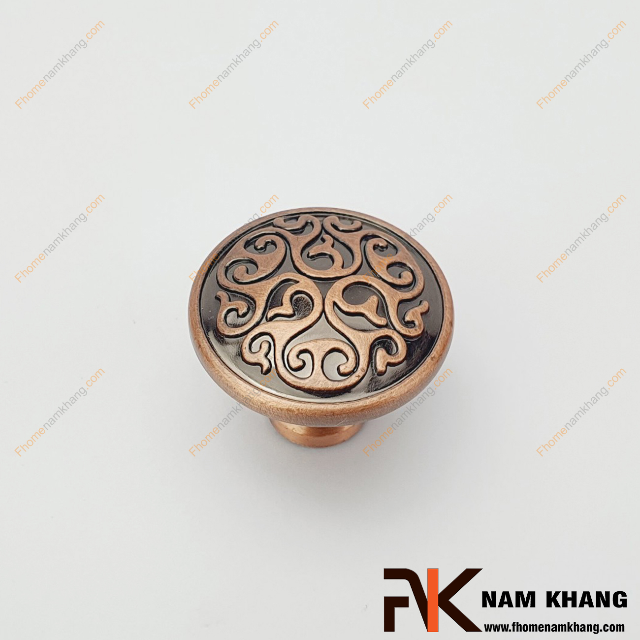 Núm cửa tủ màu đồng cổ NK048-HC, thiết kế đơn giản, họa tiết xoay tròn đối xứng phù hợp với nhiều phong cách tủ kệ.