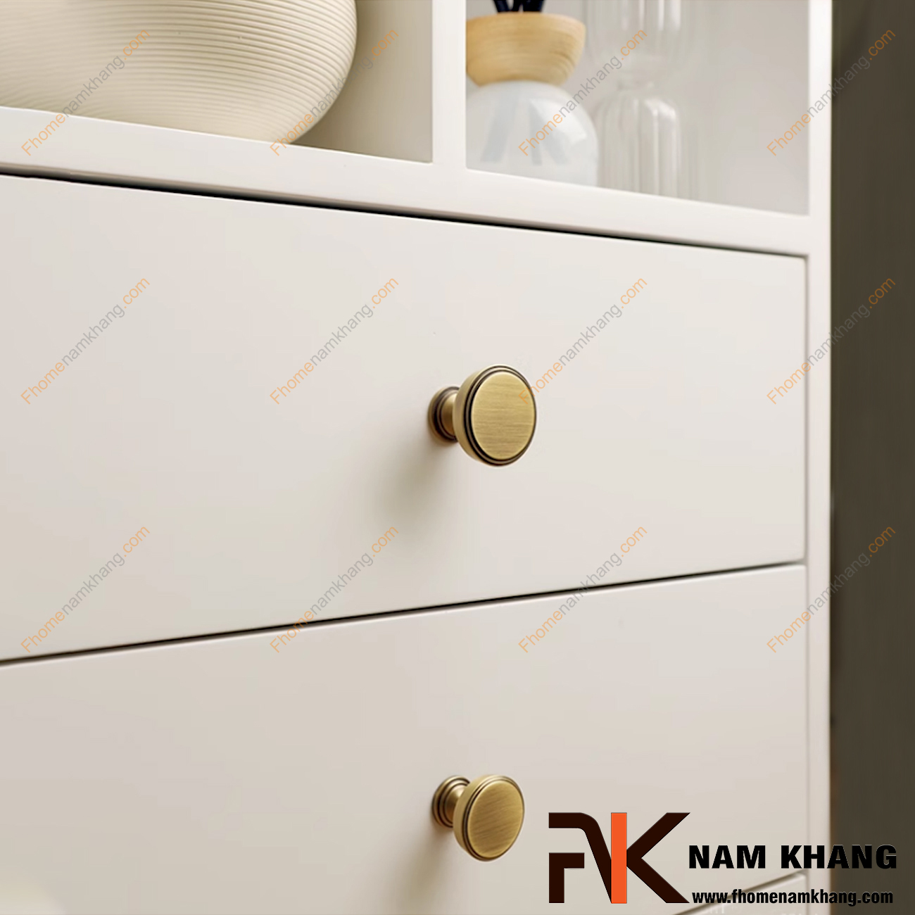Núm tay nắm tủ