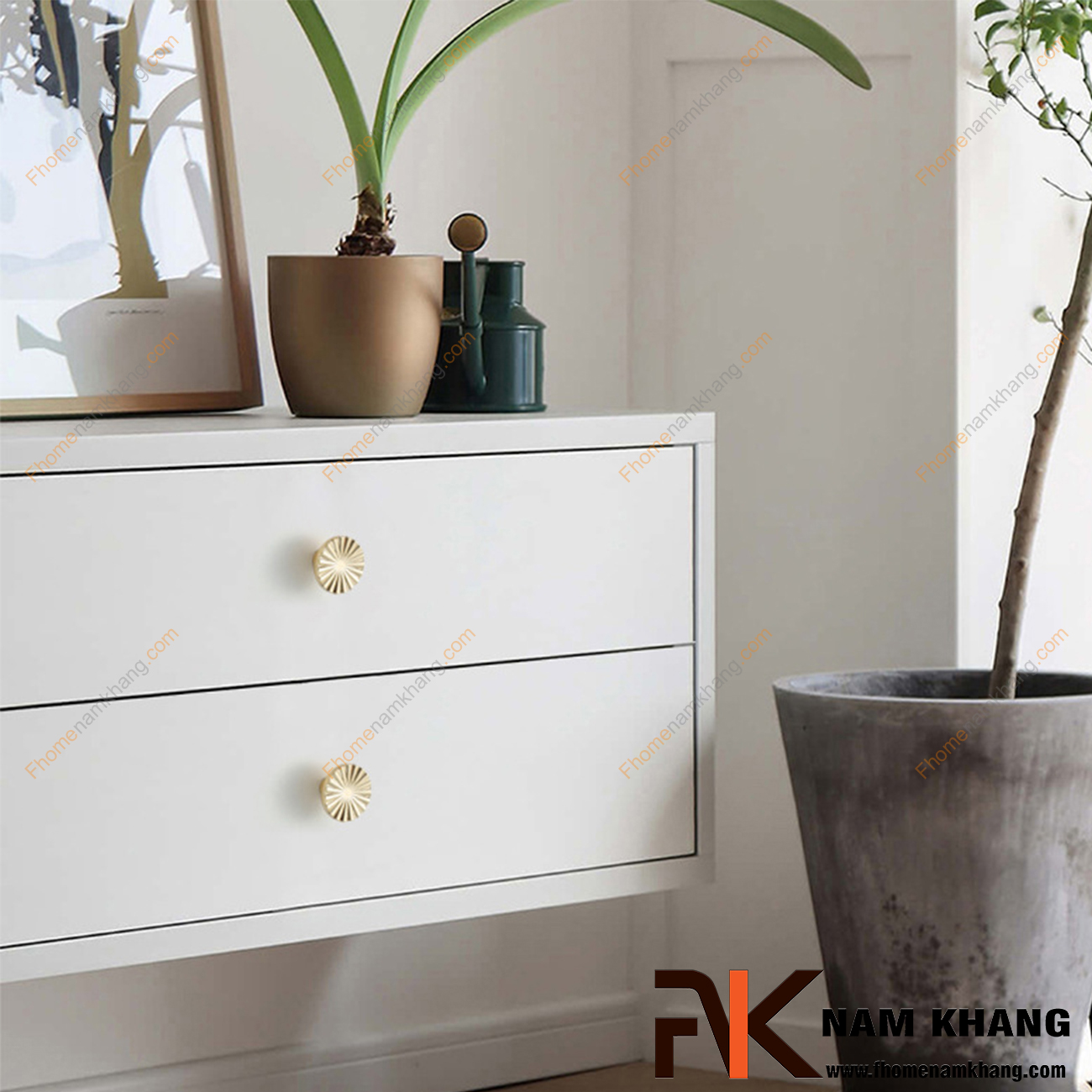 Núm tay nắm tủ