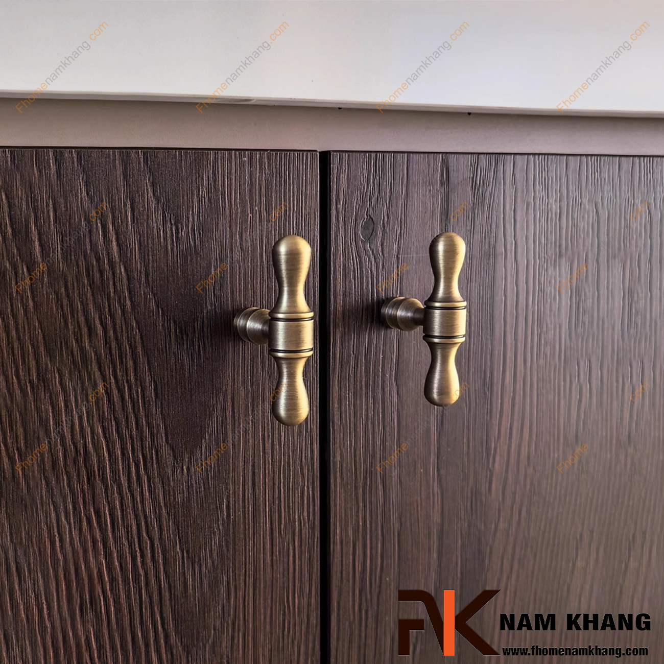 Núm tay nắm tủ