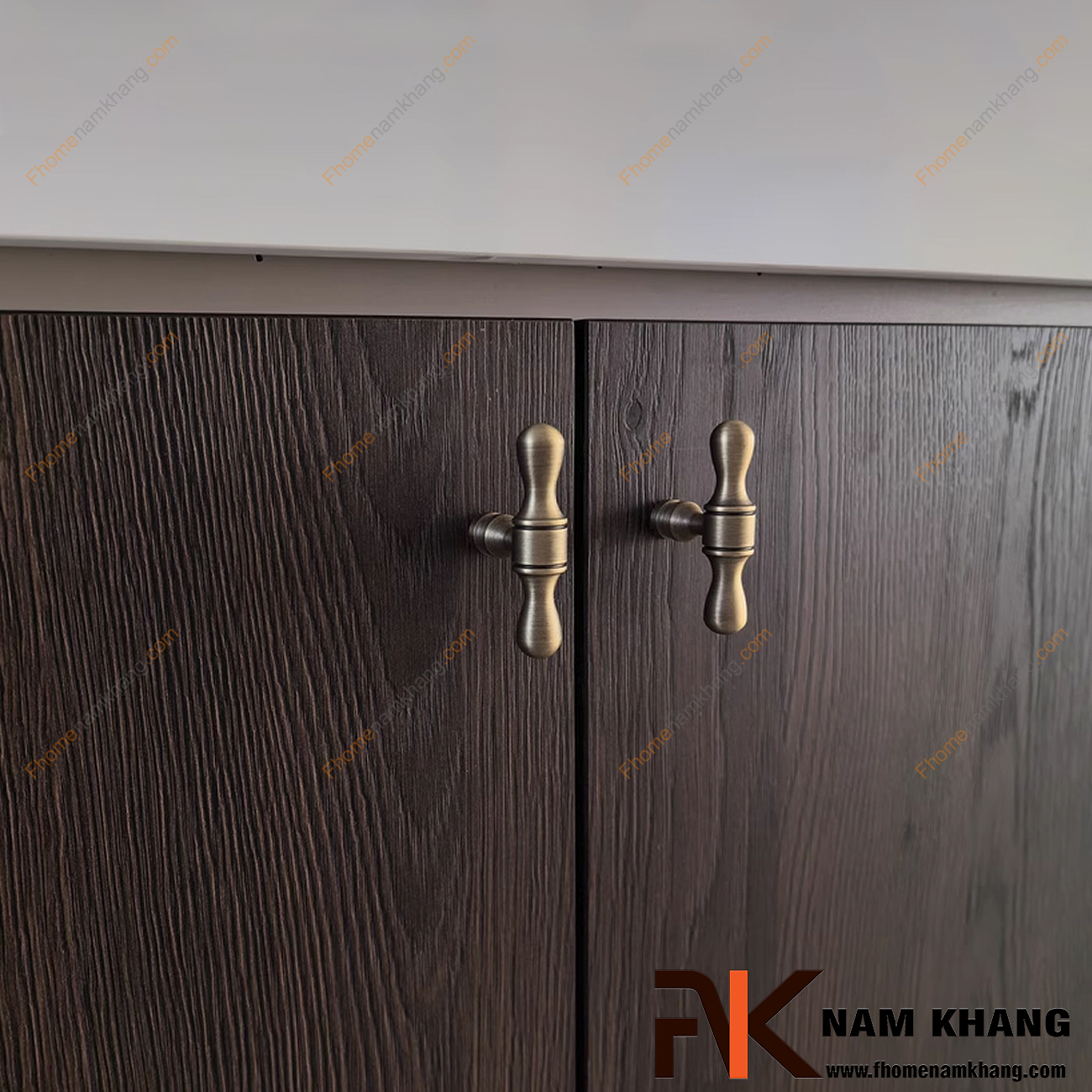 Núm tay nắm tủ