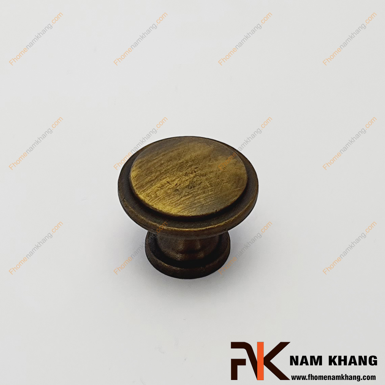 Núm cửa tủ dạng tròn màu đồng cổ NK204-AC có khuôn dạng dẹp bo tròn góc cạnh tinh tế được sử dụng nhiều trên nhiều phong cách tủ kệ khác nhau